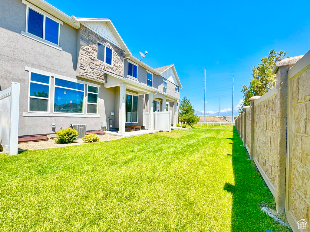 View of fenced backyard