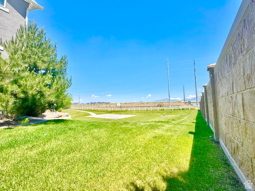 View of grassy yard featuring a view of rural / pastoral area