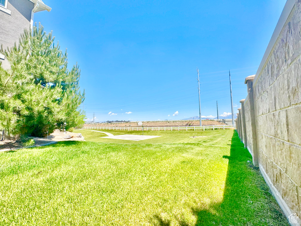 View of grassy yard featuring a view of countryside