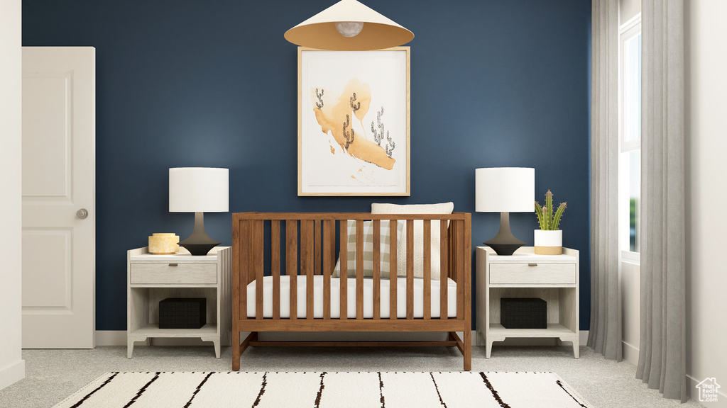 Carpeted bedroom with multiple windows and a nursery area