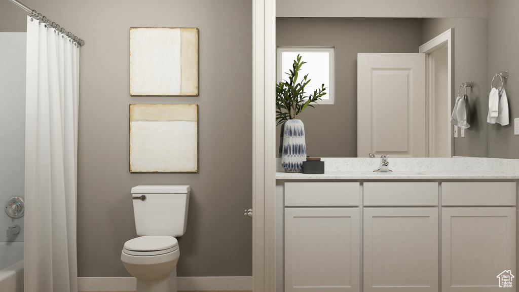 Bathroom with vanity and shower / bathtub combination with curtain