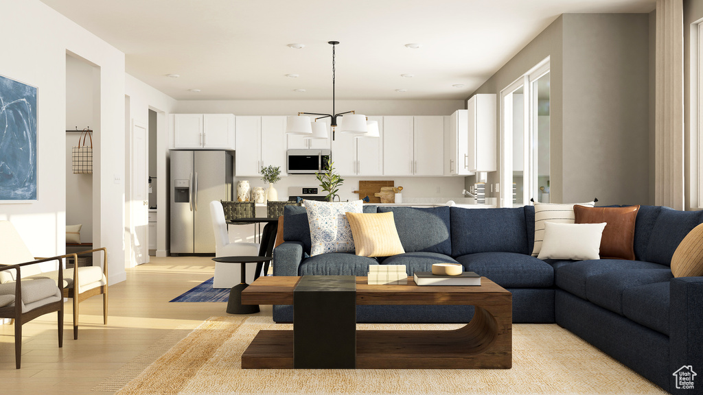 Living area featuring light wood-type flooring and recessed lighting