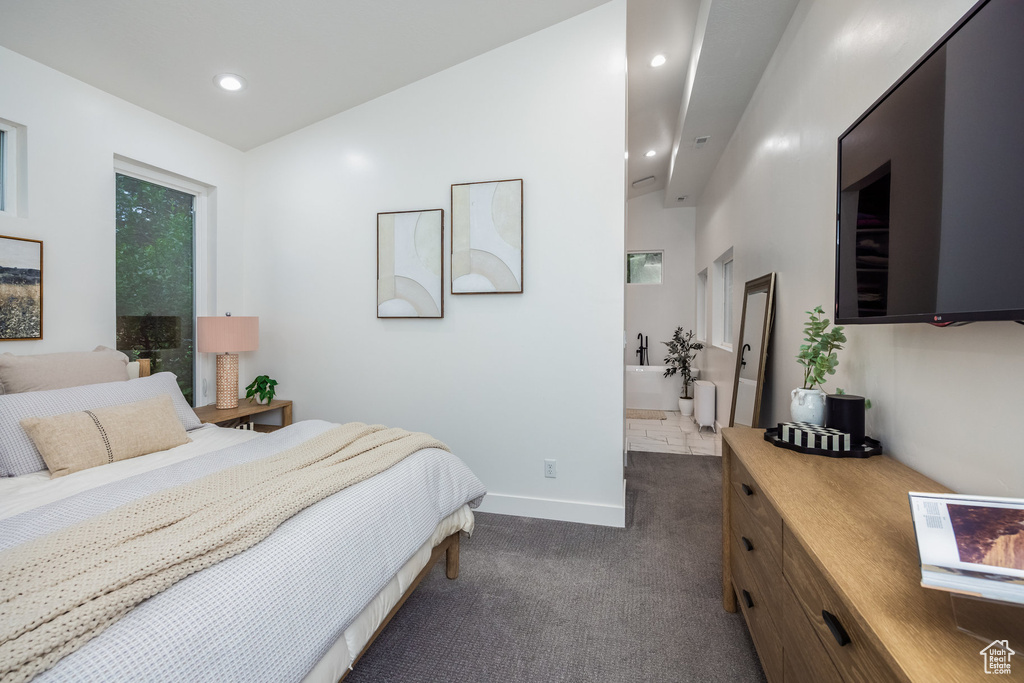 Bedroom featuring dark colored carpet and recessed lighting