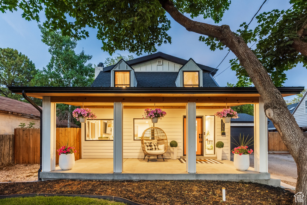 View of outbuilding with a porch