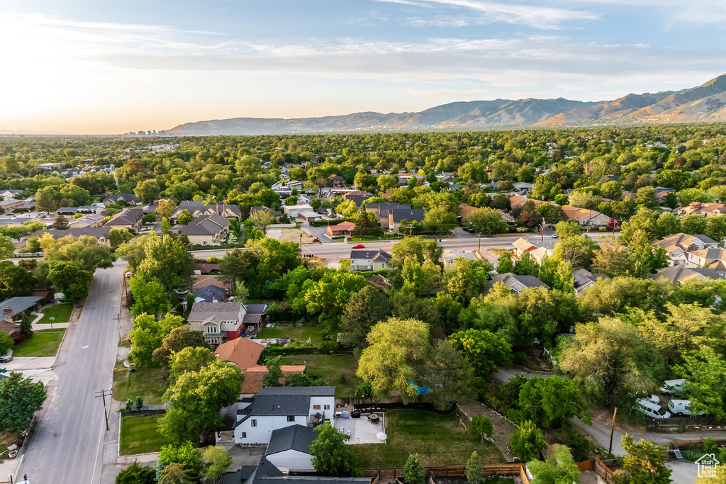 Aerial view at dusk of a mountain view and a residential view