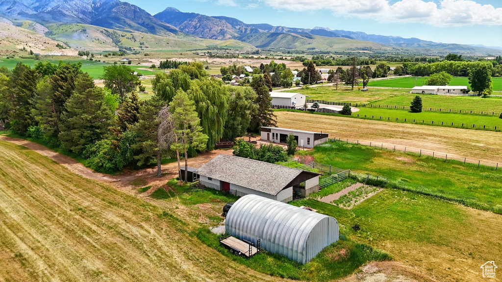Aerial view of sparsely populated area with a mountainous background