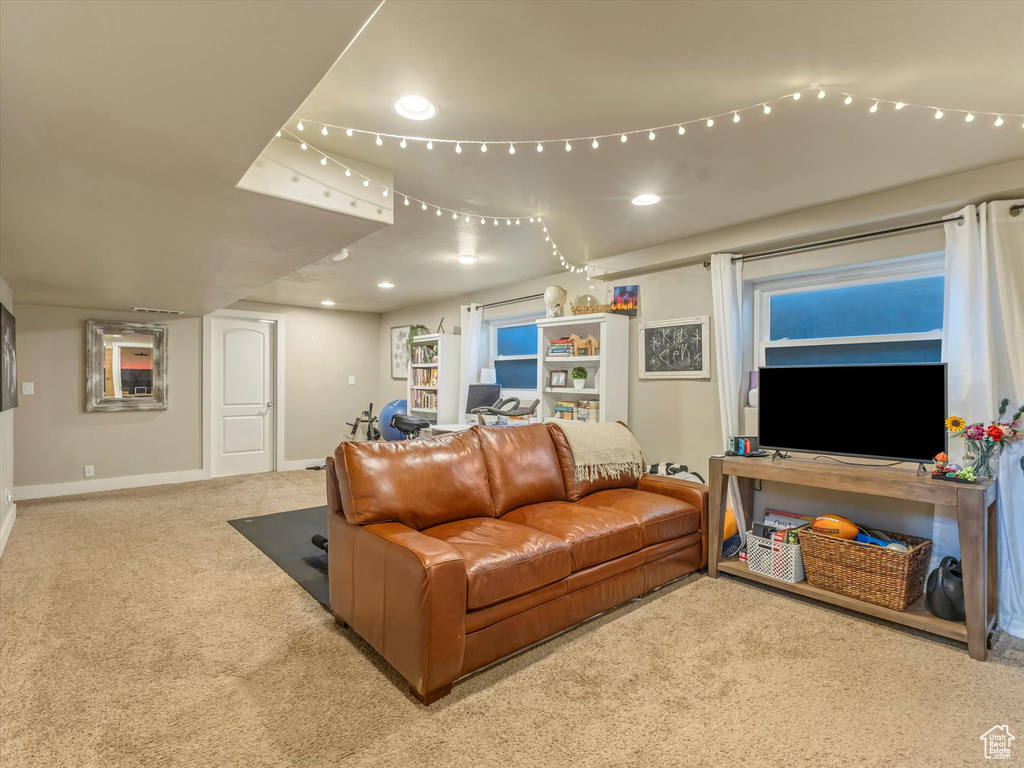 Living room featuring carpet floors and recessed lighting
