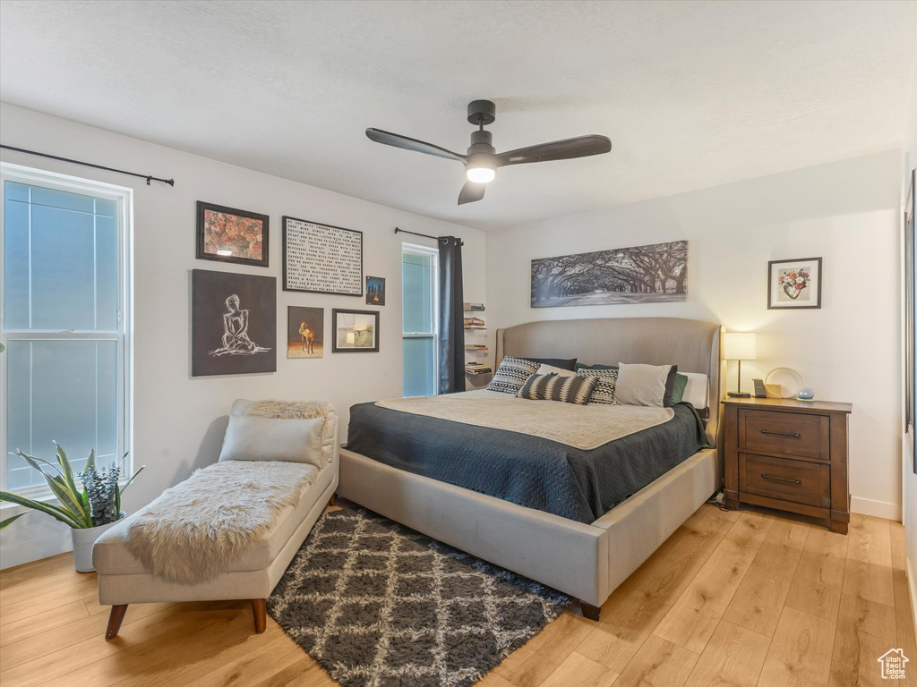 Bedroom featuring light wood finished floors and ceiling fan