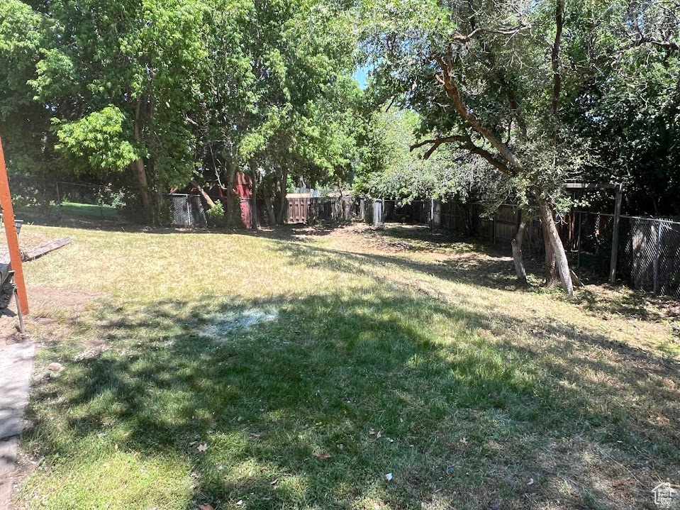 View of fenced backyard