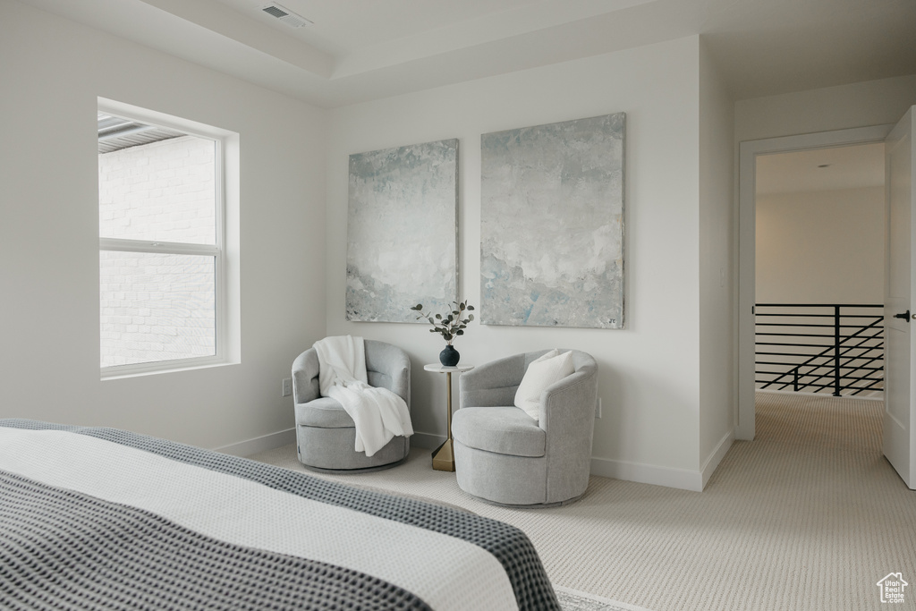 Bedroom with carpet flooring and baseboards