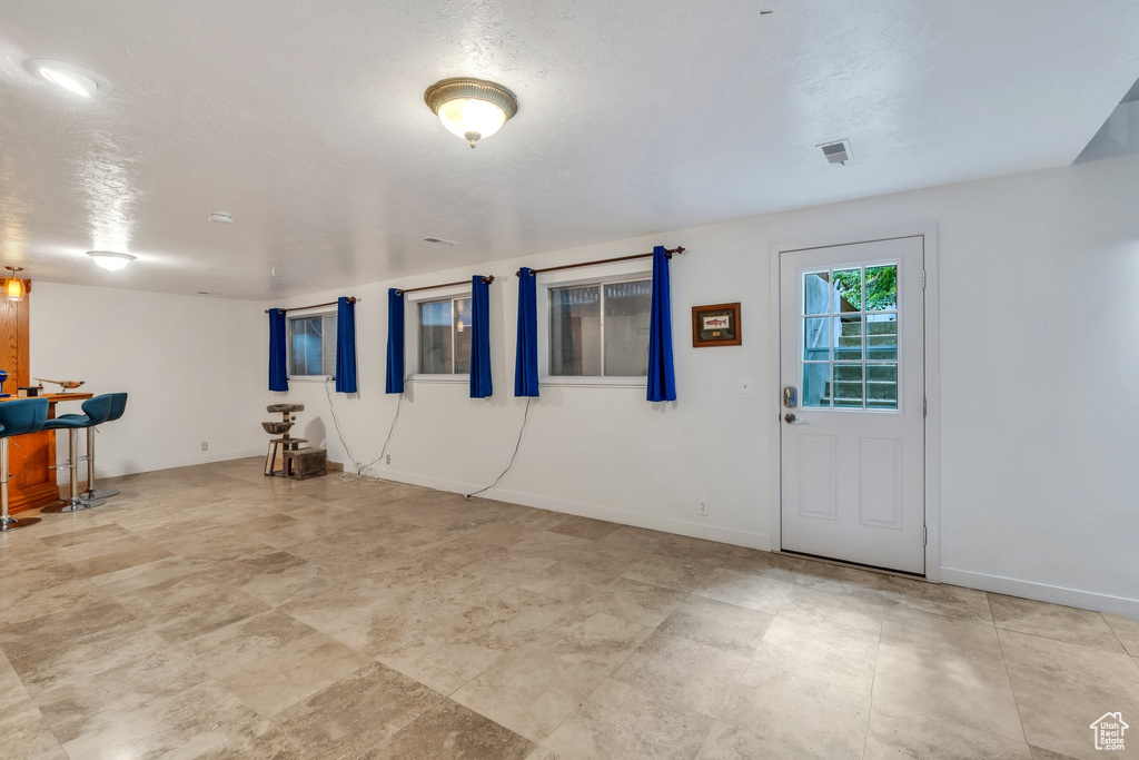 Entryway featuring baseboards