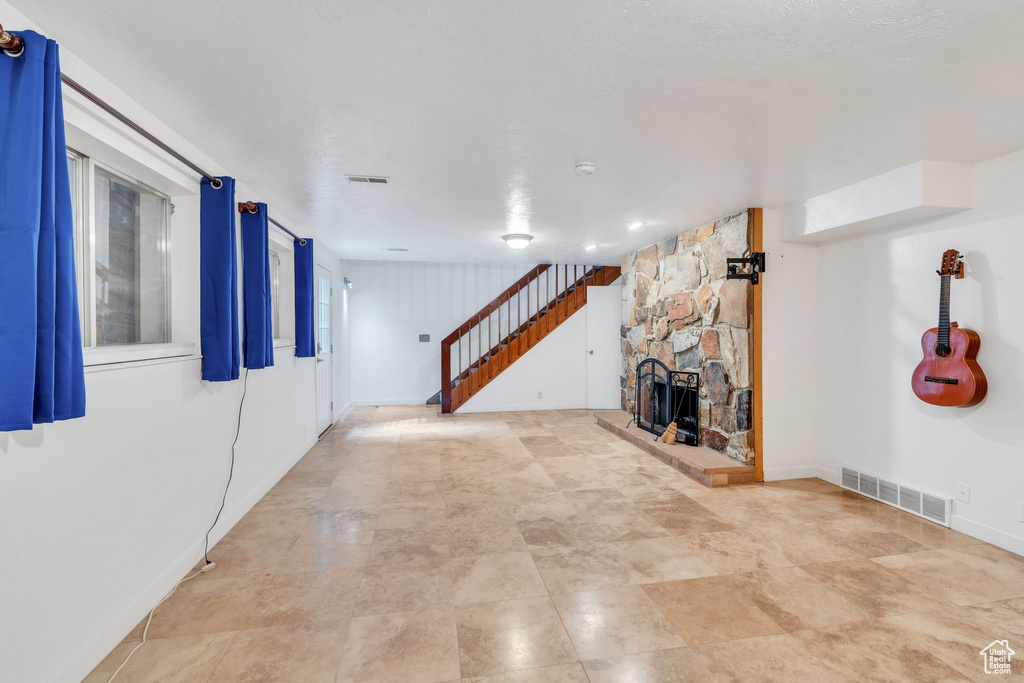 Hall featuring stairs and baseboards