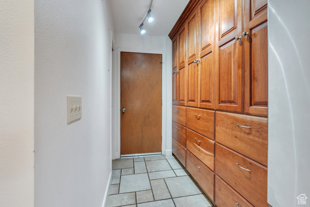 Doorway to outside with baseboards