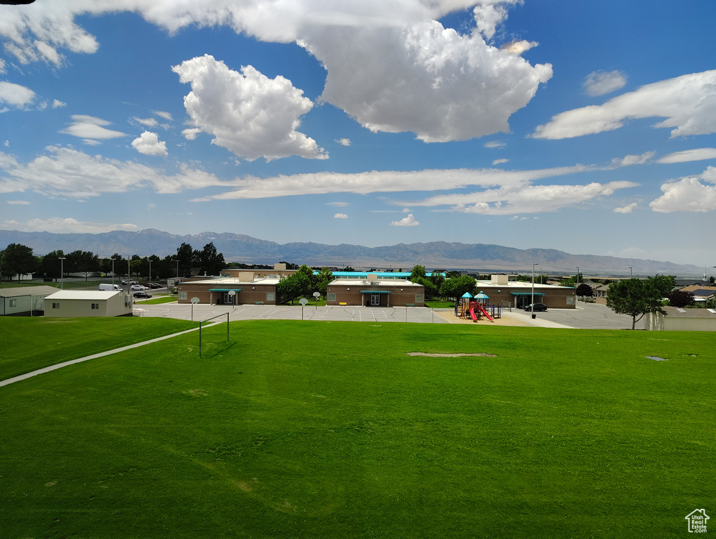 Surrounding community featuring a mountain view