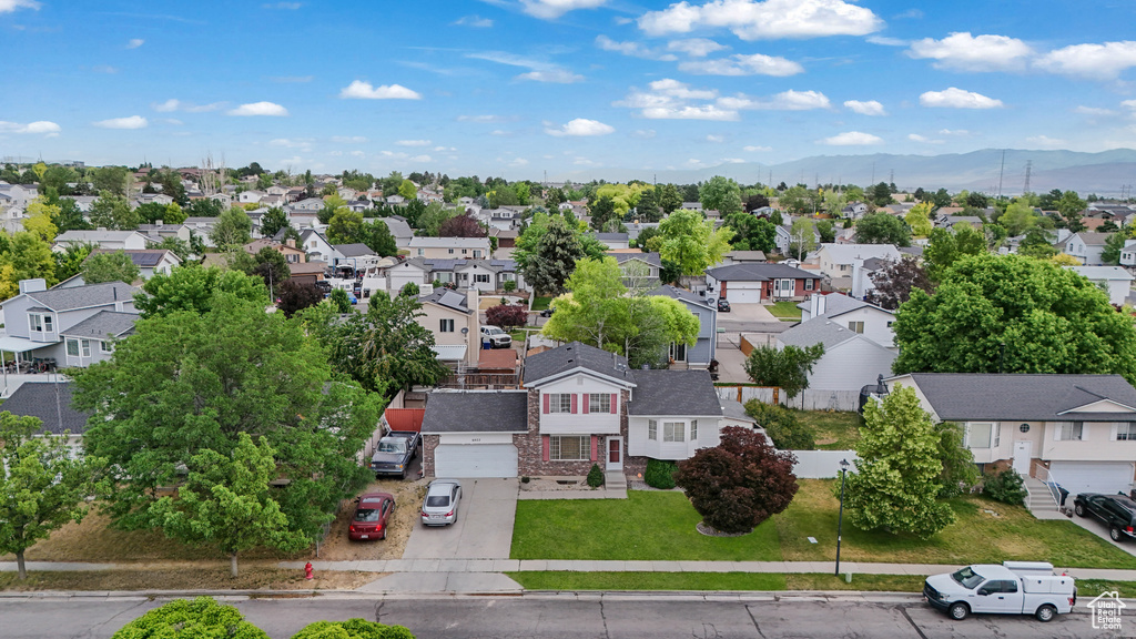 Aerial view of residential area with mountains