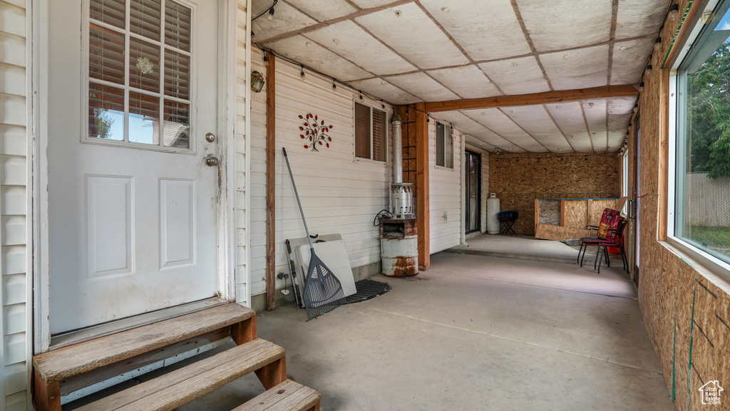 Property entrance featuring covered porch