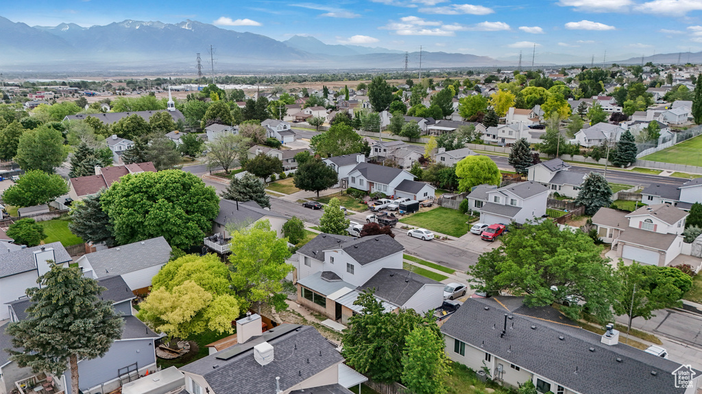 Aerial view of residential area with a mountain backdrop