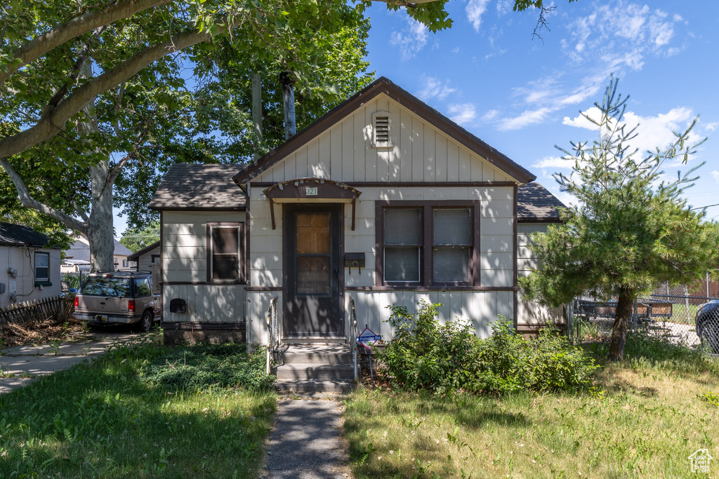 View of front of property featuring board and batten siding