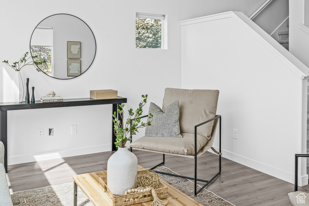 Living area with wood finished floors
