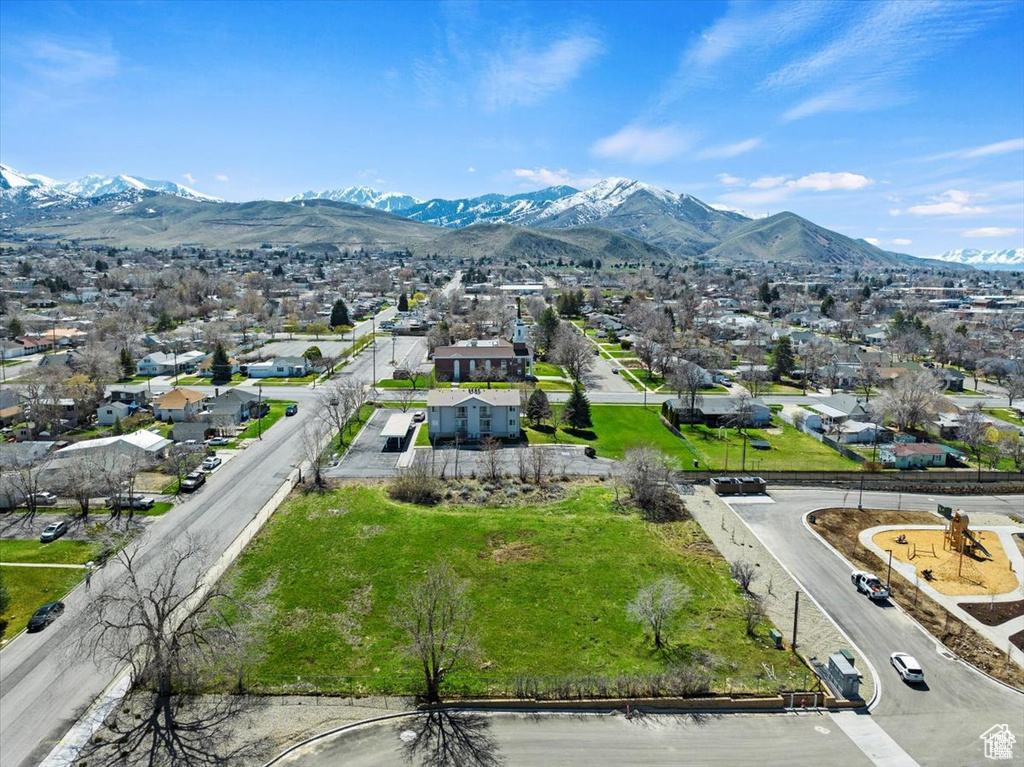 Aerial perspective of suburban area with mountains