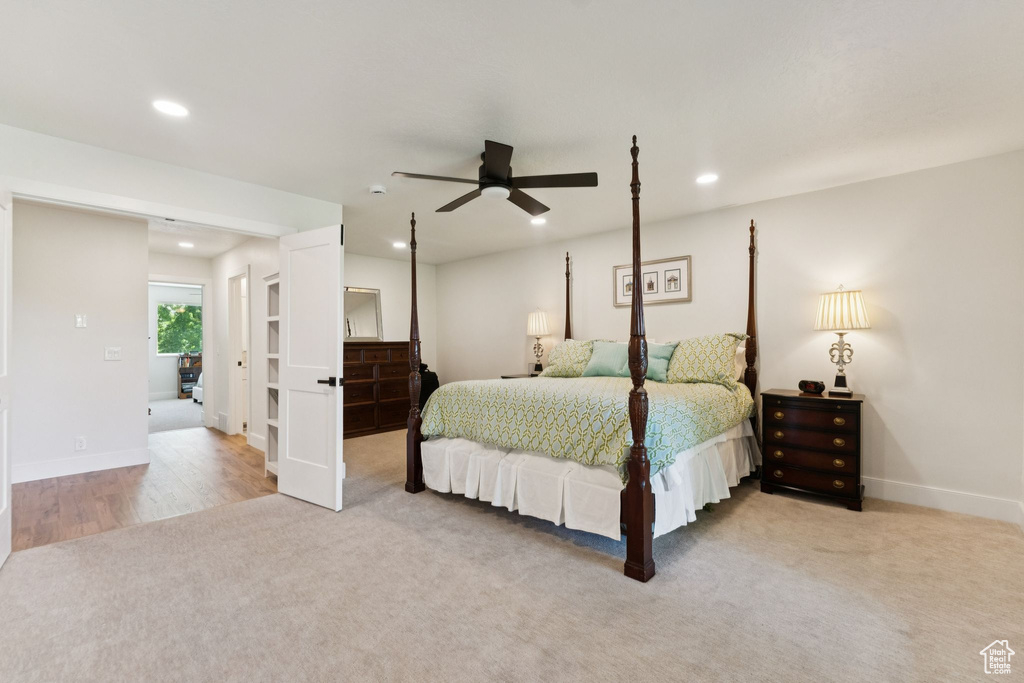 Bedroom with recessed lighting, light carpet, and a ceiling fan