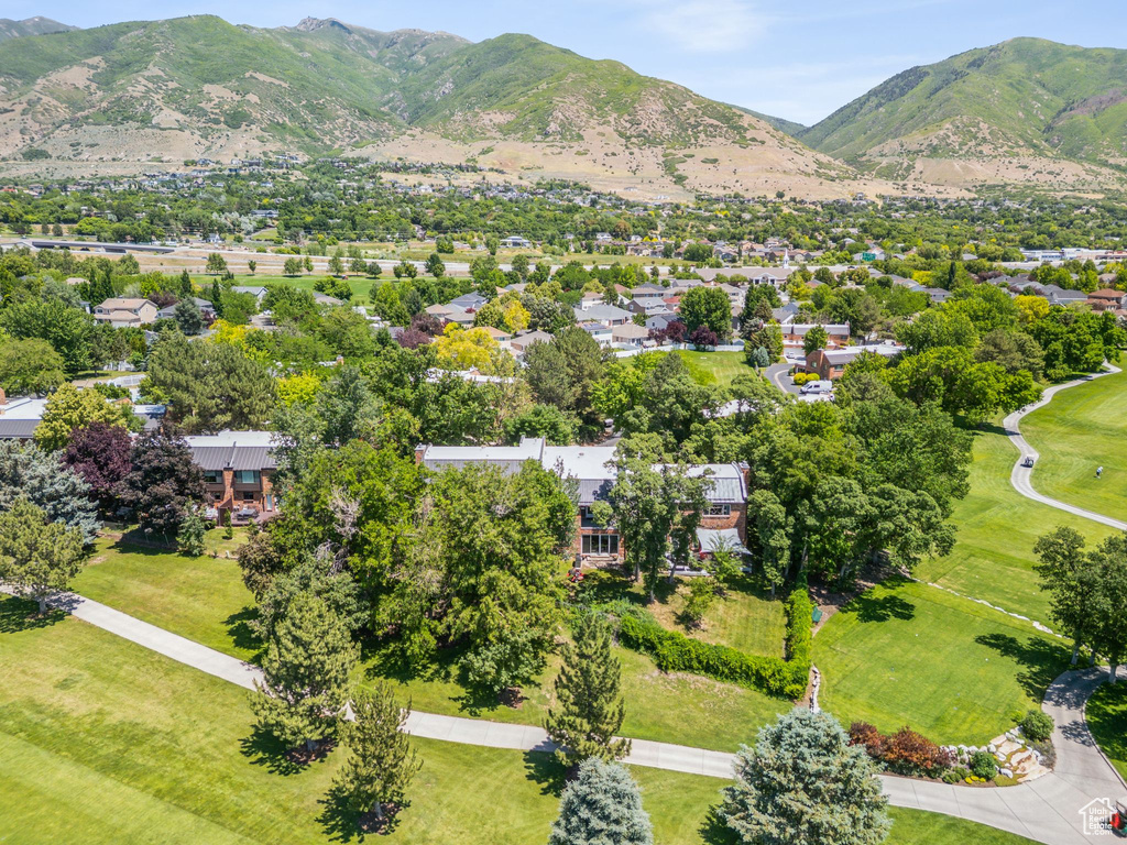 Aerial view of residential area with a mountain backdrop