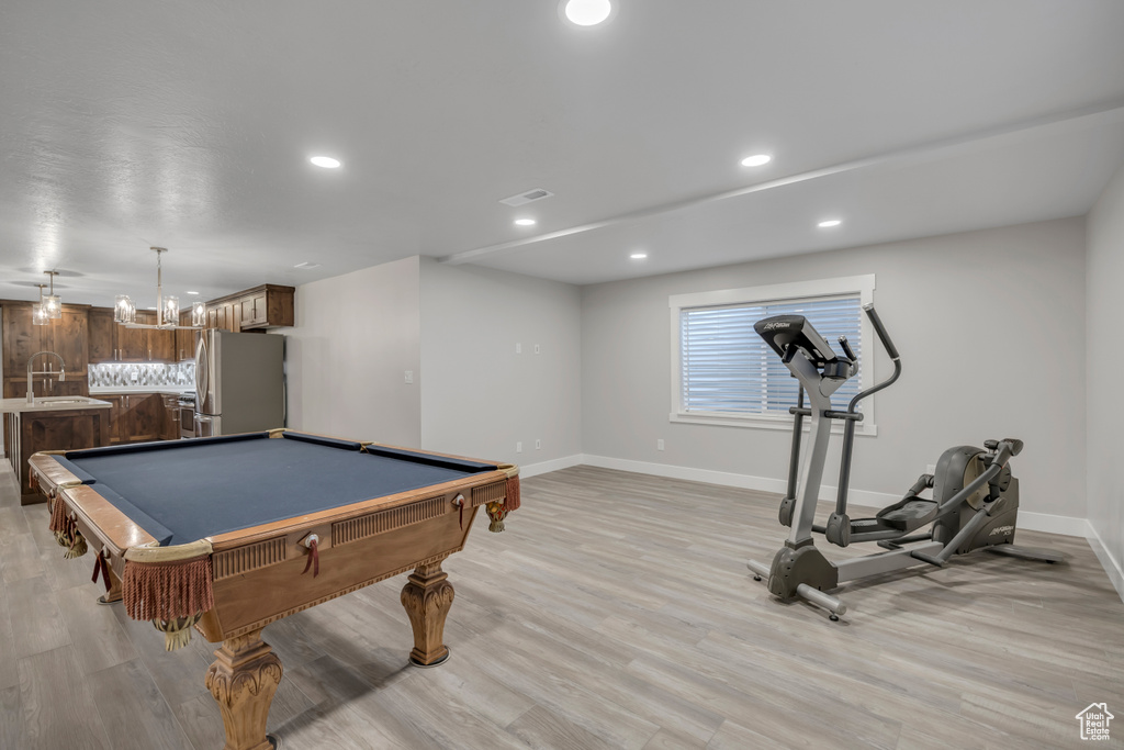 Rec room with light wood finished floors, recessed lighting, and pool table