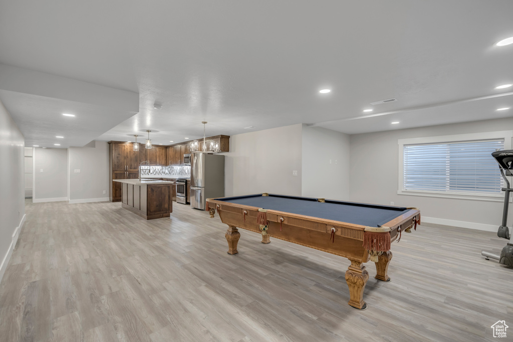 Game room featuring recessed lighting, light wood finished floors, and billiards