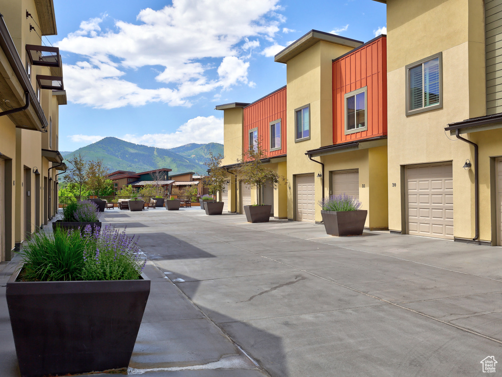 View of concrete road featuring a mountain view