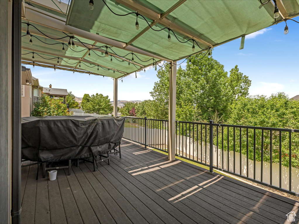 Wooden deck with a grill