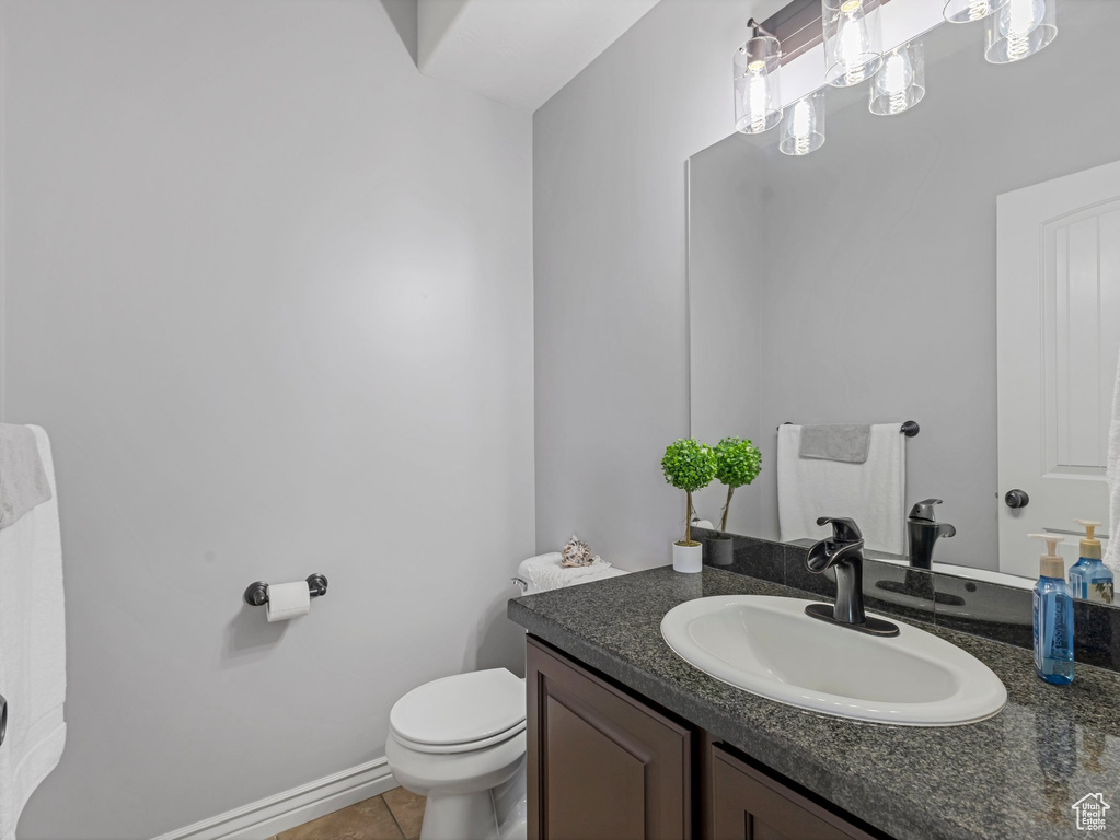 Bathroom featuring vanity and tile patterned flooring