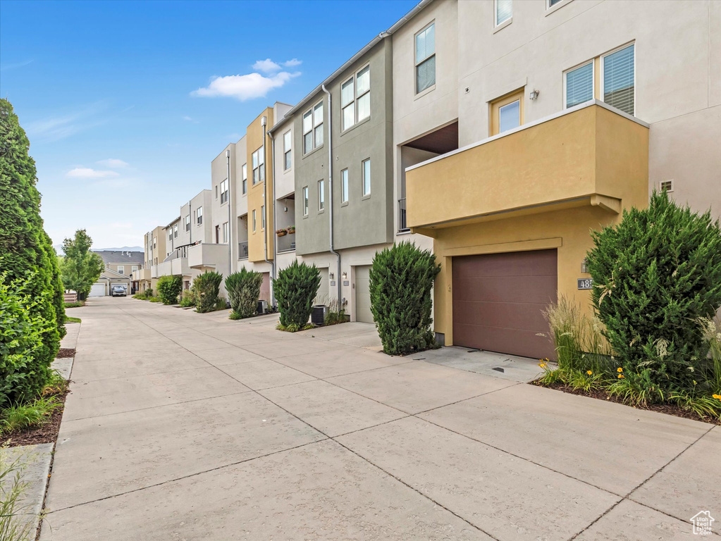 View of concrete road featuring a residential view