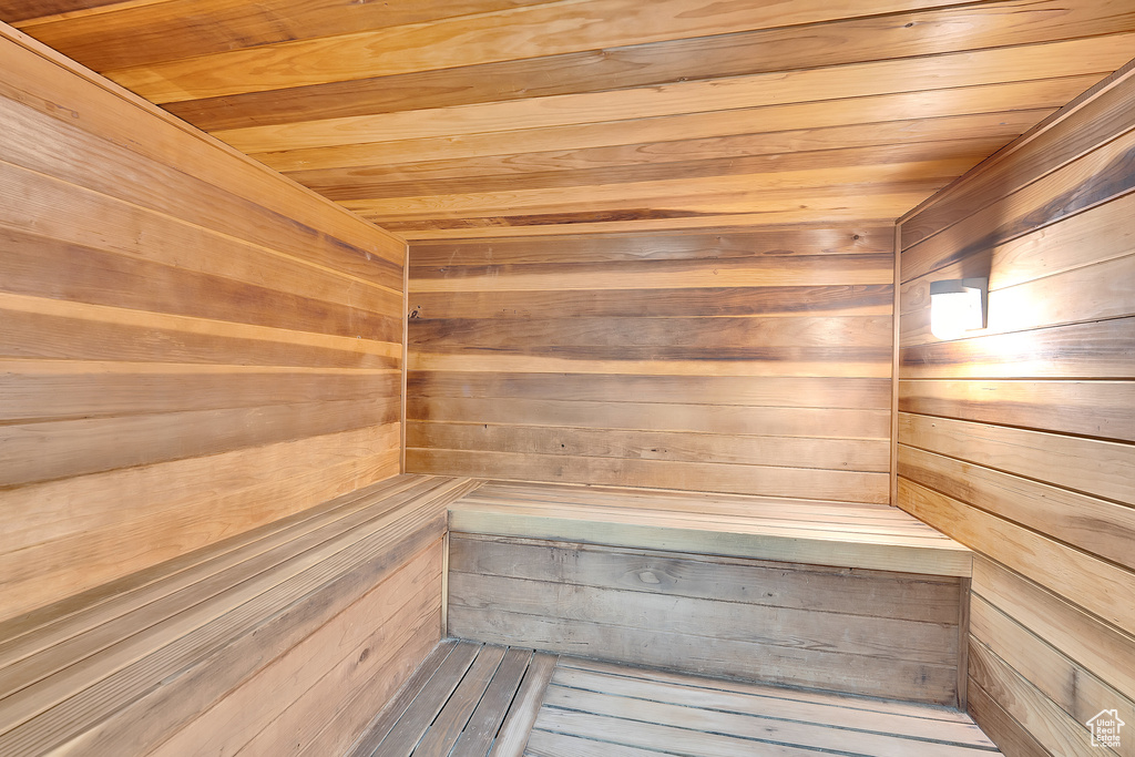 Relaxing sauna with wood ceiling and wood walls