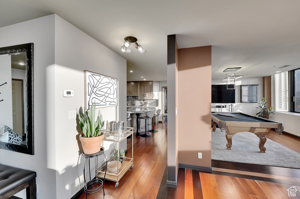 Rec room featuring wood-type flooring and billiards table