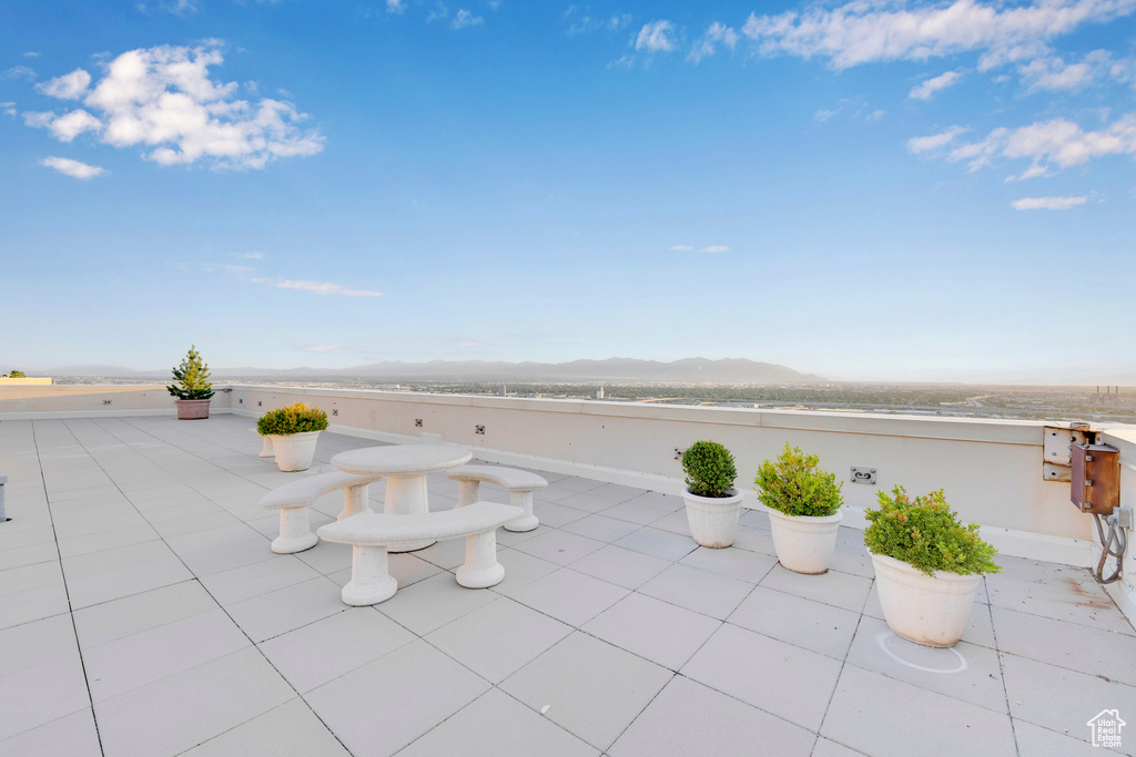 View of patio / terrace with a mountain view