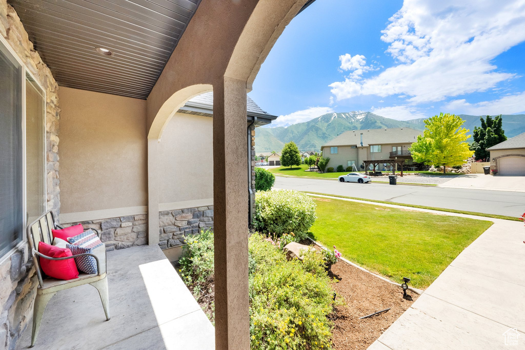 View of patio / terrace with a mountain view