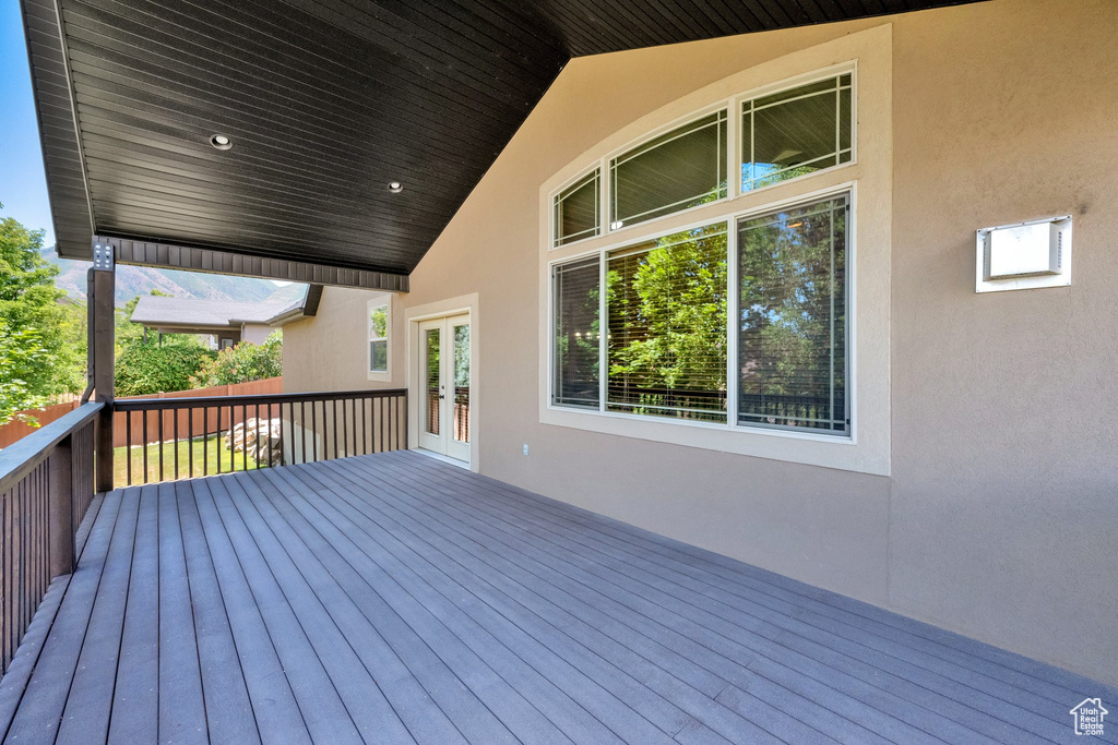 Wooden deck featuring french doors