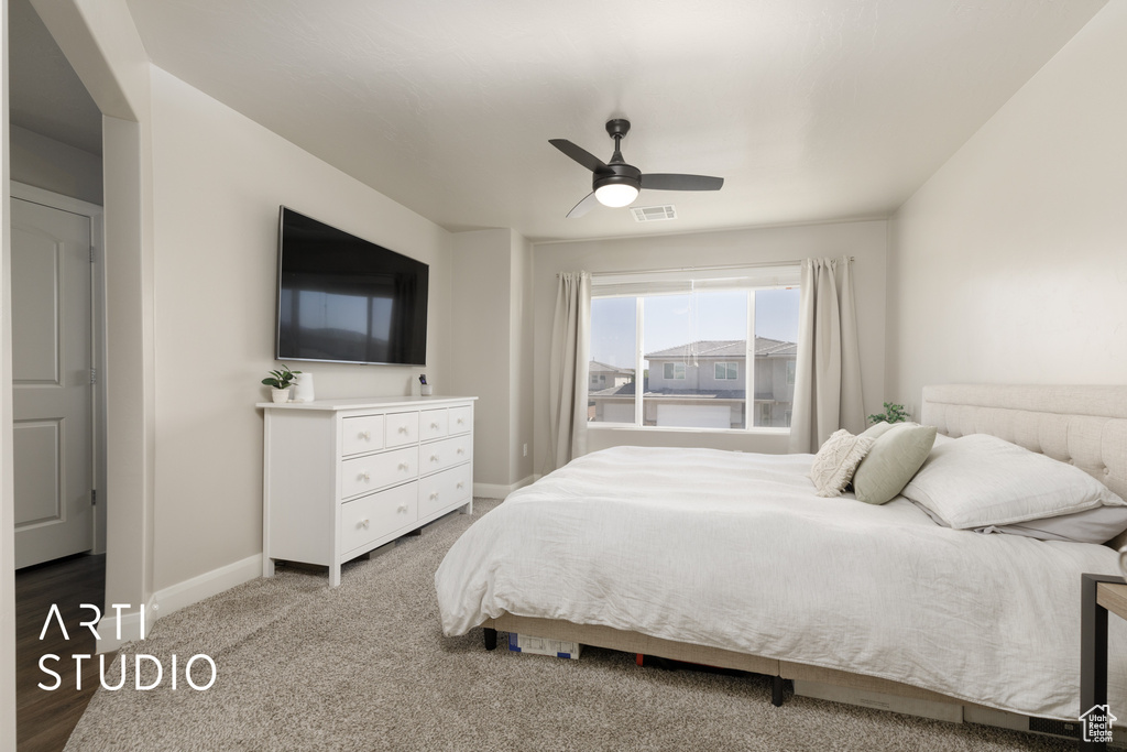 Bedroom with baseboards and a ceiling fan