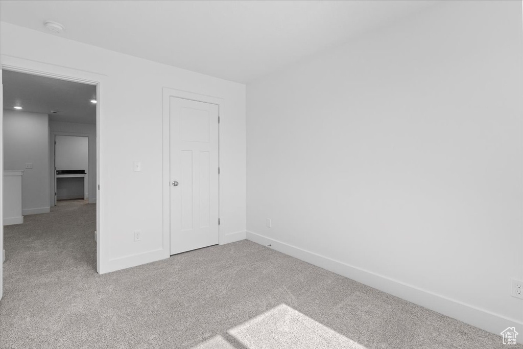 Unfurnished bedroom featuring carpet flooring