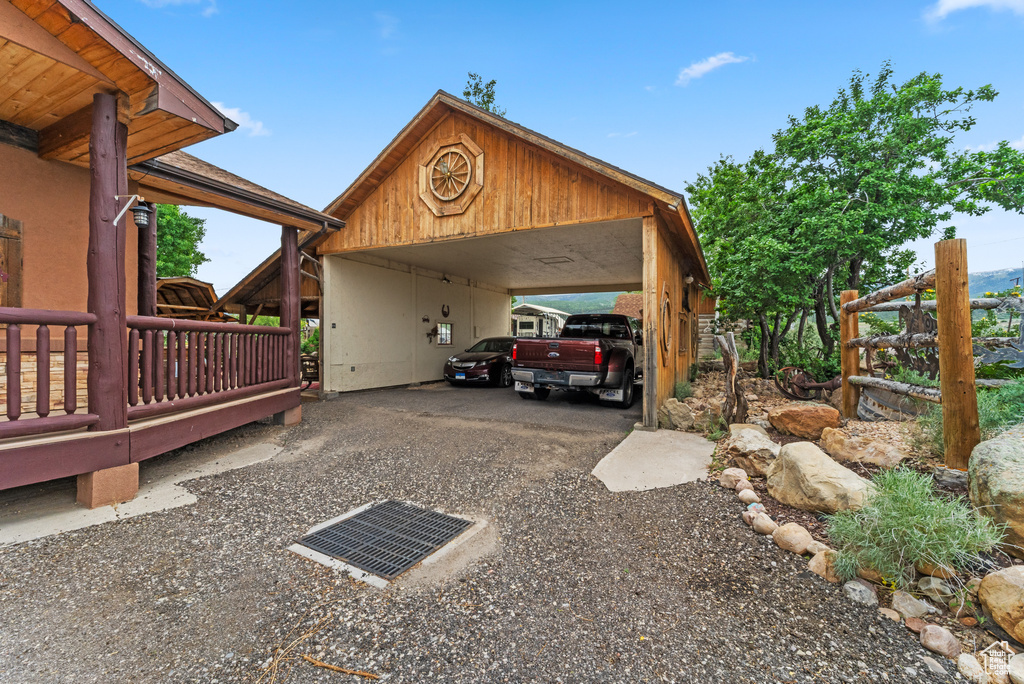 View of car parking with a carport