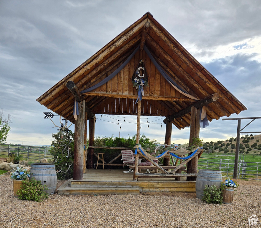View of community with a gazebo and a deck