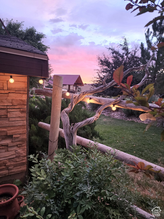 View of yard at dusk