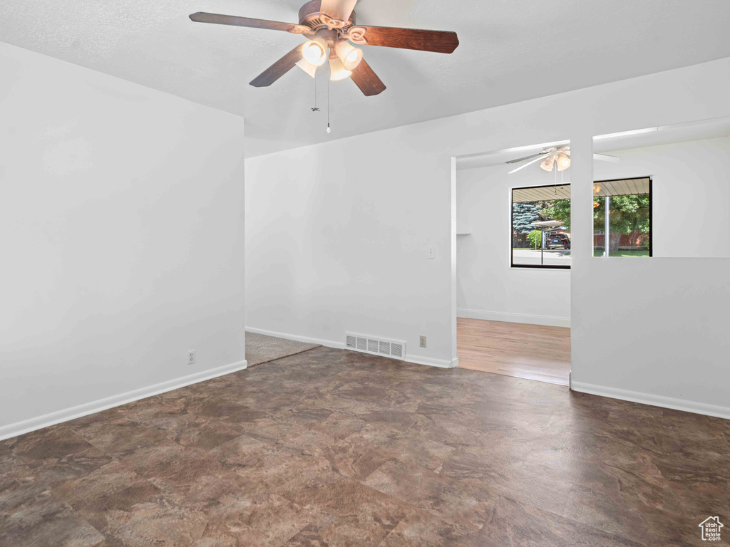 Spare room featuring ceiling fan