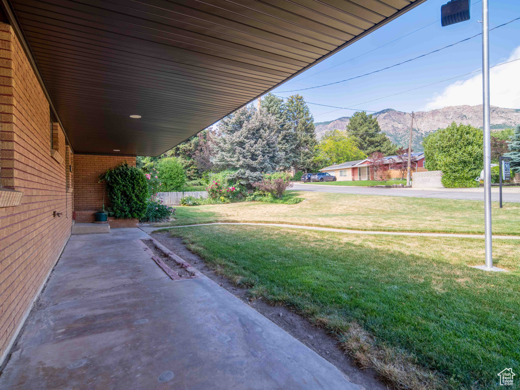 View of patio / terrace with a mountain view
