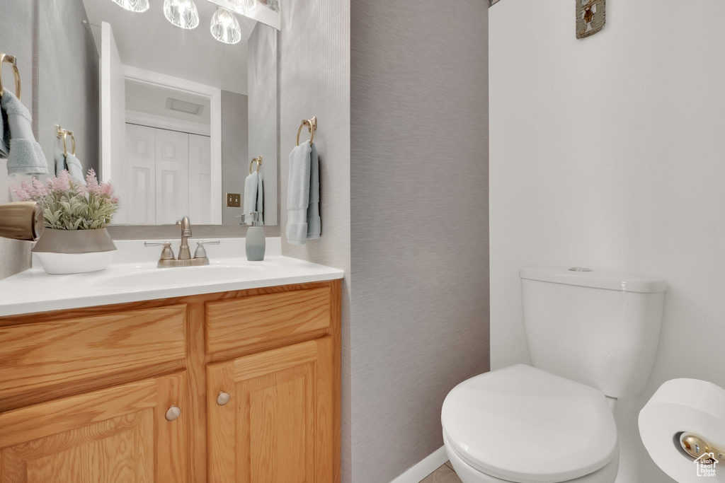 Half bath with toilet and vanity