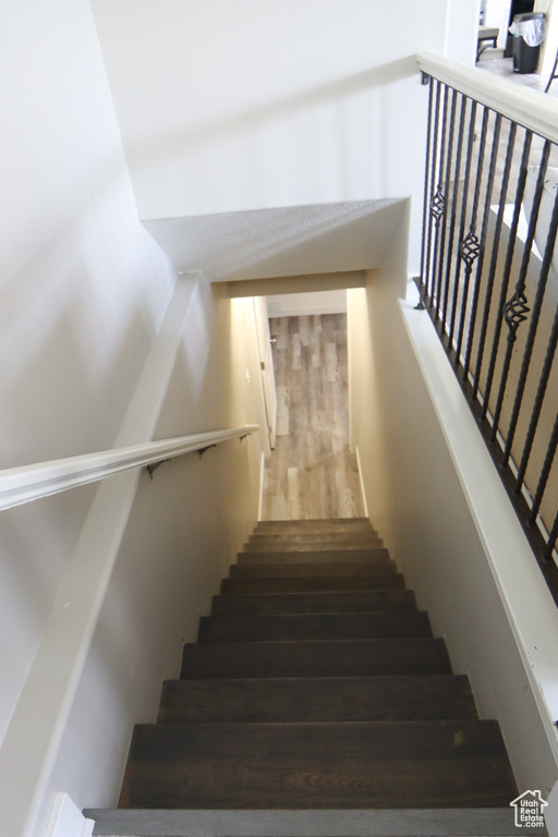 Stairway with wood finished floors