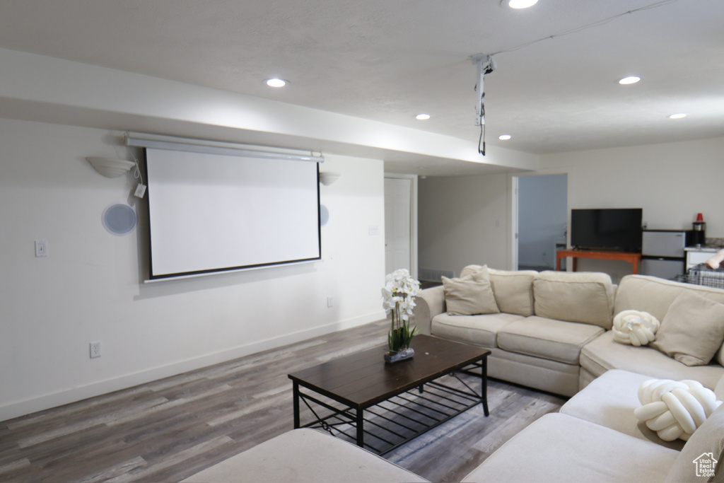 Cinema room featuring recessed lighting and wood finished floors