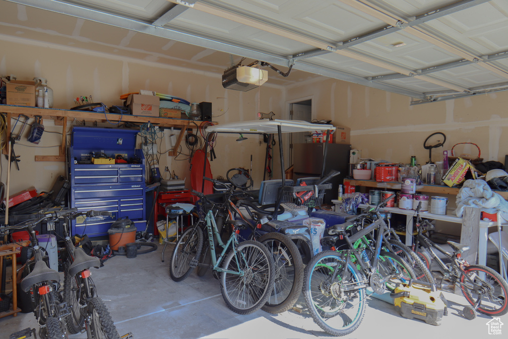 Garage featuring a garage door opener