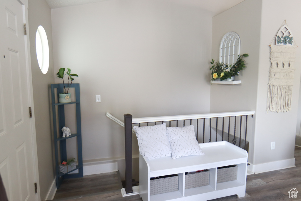 Entrance foyer with wood finished floors