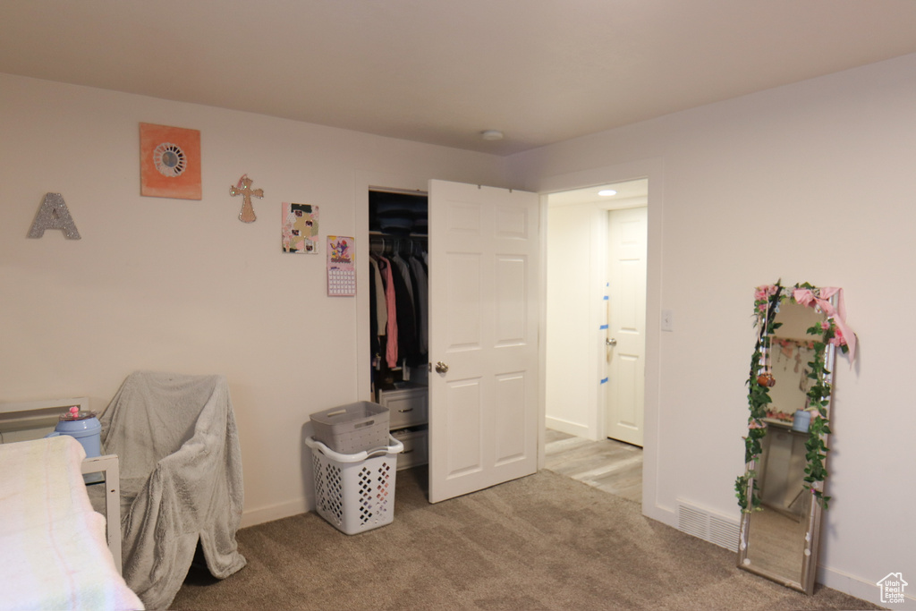 Office area with carpet flooring and baseboards